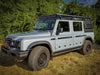 ACS Full Length Platform Roof Rack on INEOS Grenadier, ideal for modular gear hauling and off-road adventures.