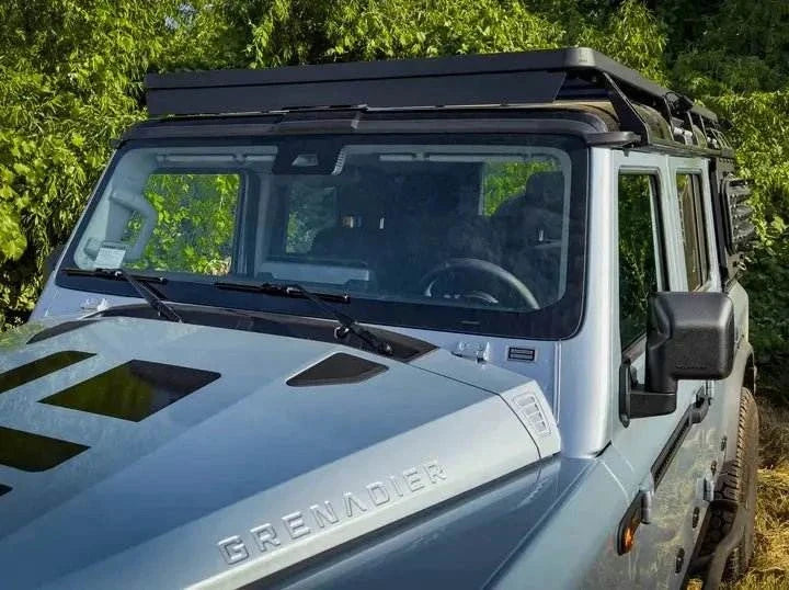ACS Full Length Platform Roof Rack installed on INEOS Grenadier vehicle, showcasing modular design and durability for gear hauling.