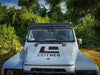 ACS Full Length Platform Roof Rack on INEOS Grenadier in outdoor setting.