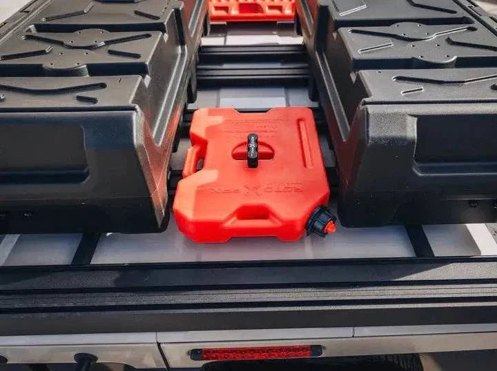 ACS Full Length Platform Roof Rack for INEOS Grenadier loaded with gear and fuel container.