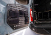 Rear Door Modular MOLLE storage panel mounted on Mercedes Sprinter rear door with attached black pouches for organized gear storage.