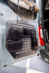 Rear door modular MOLLE storage panel mounted on Mercedes Sprinter 2019+ with attached black gear pouches