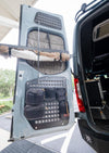 Rear door modular MOLLE storage panel mounted on Mercedes Sprinter 2019+ with gear pouches attached