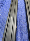 144 Sprinter Baja Roof Rack black T-slotted crossbars on blue padded surface with minor scuffs and scratches