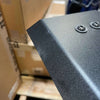 Close-up of scratched black 144 Sprinter Baja Roof Rack metal corner with two screws.