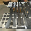 170 inch Backroad Innovations Sprinter Baja Roof Rack metal crossbars laid out on padded surface for assembly