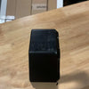 Black winch fairlead with minor scuffs on wooden surface, satin black finish.