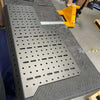 Black powder-coated aluminum Driver Sherpa panel with multiple mounting holes and minor corner ding, designed for Sprinter and Revel vehicles.