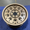 Owl Talon Sprinter wheel in bronze with minor scuffs; high load capacity, durable design.