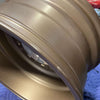 Bronze Owl Talon Sprinter wheel with minor scuffs and scratches.