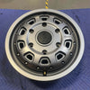 Graphite grey Talon Transit AWD wheel with minor scuffs, lightweight aluminum, 17x7 inch, 6x180mm bolt pattern, and dual valve stem system.
