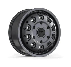 Graphite grey Talon Transit AWD wheel with minor scuffs, 17x7 inch aluminum off-road rim.