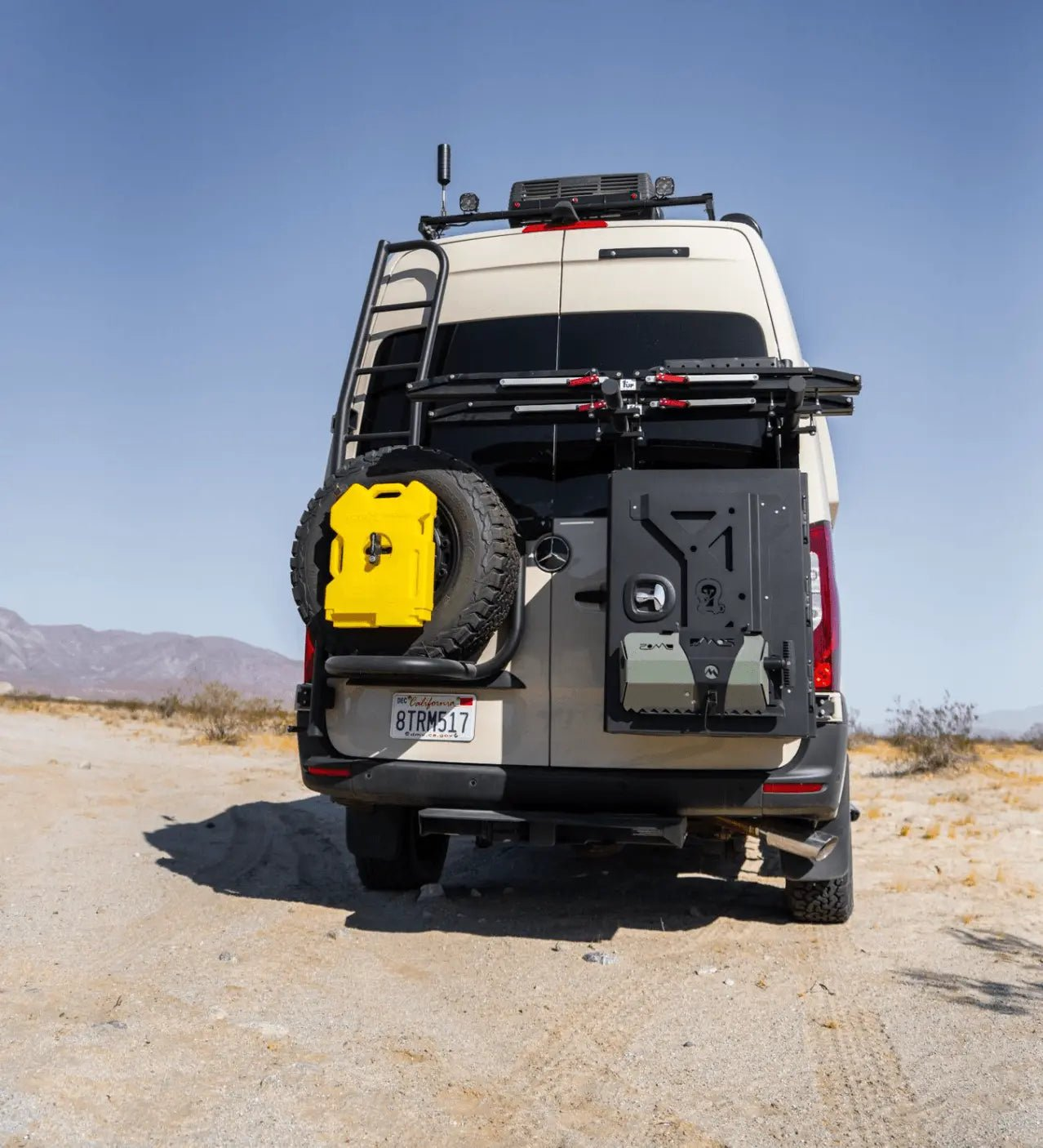 Bike rack and box carrier for 2019+ Sprinter VS30 featuring swing-arm system and steel frame.