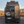 Sprinter van equipped with Owl B2 Pro rear door bike rack and box carrier with spare tire and rooftop storage rack.