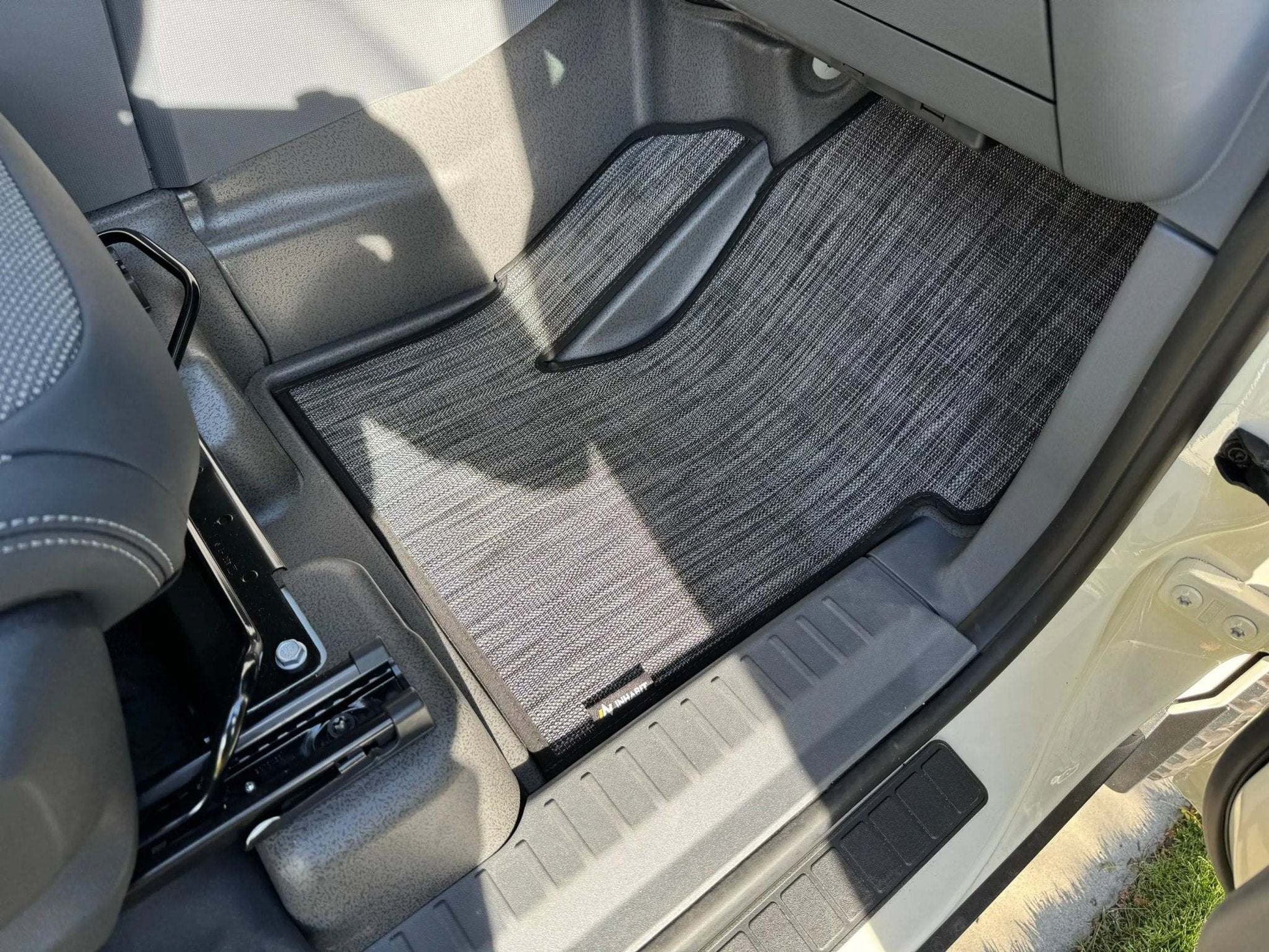 Custom floor mat for INEOS Grenadier, offering comfort and protection, tailored fit, and easy maintenance.