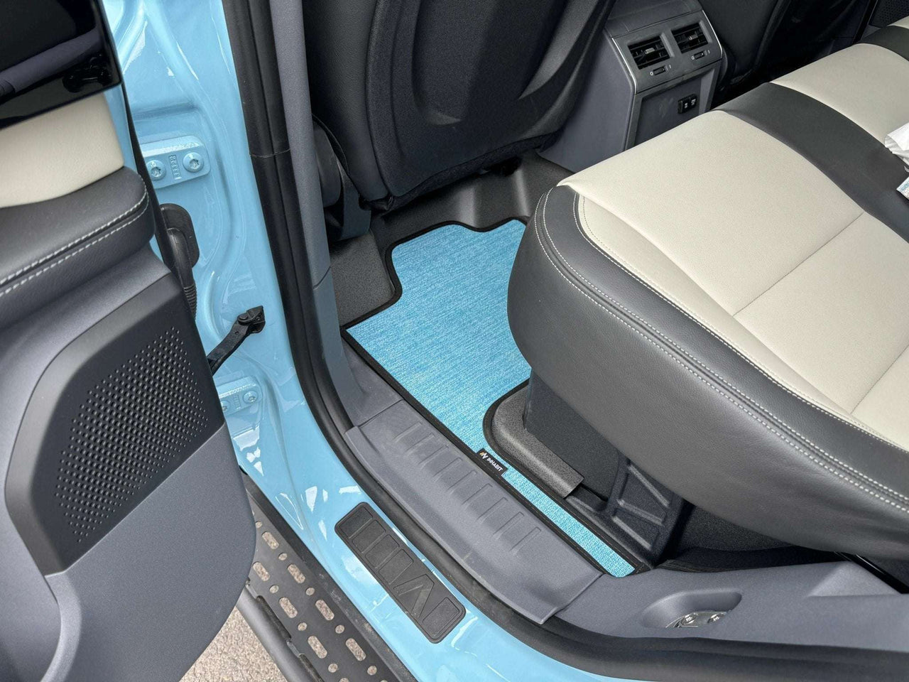 Custom floor mats for INEOS Grenadier interior, designed for comfort and protection