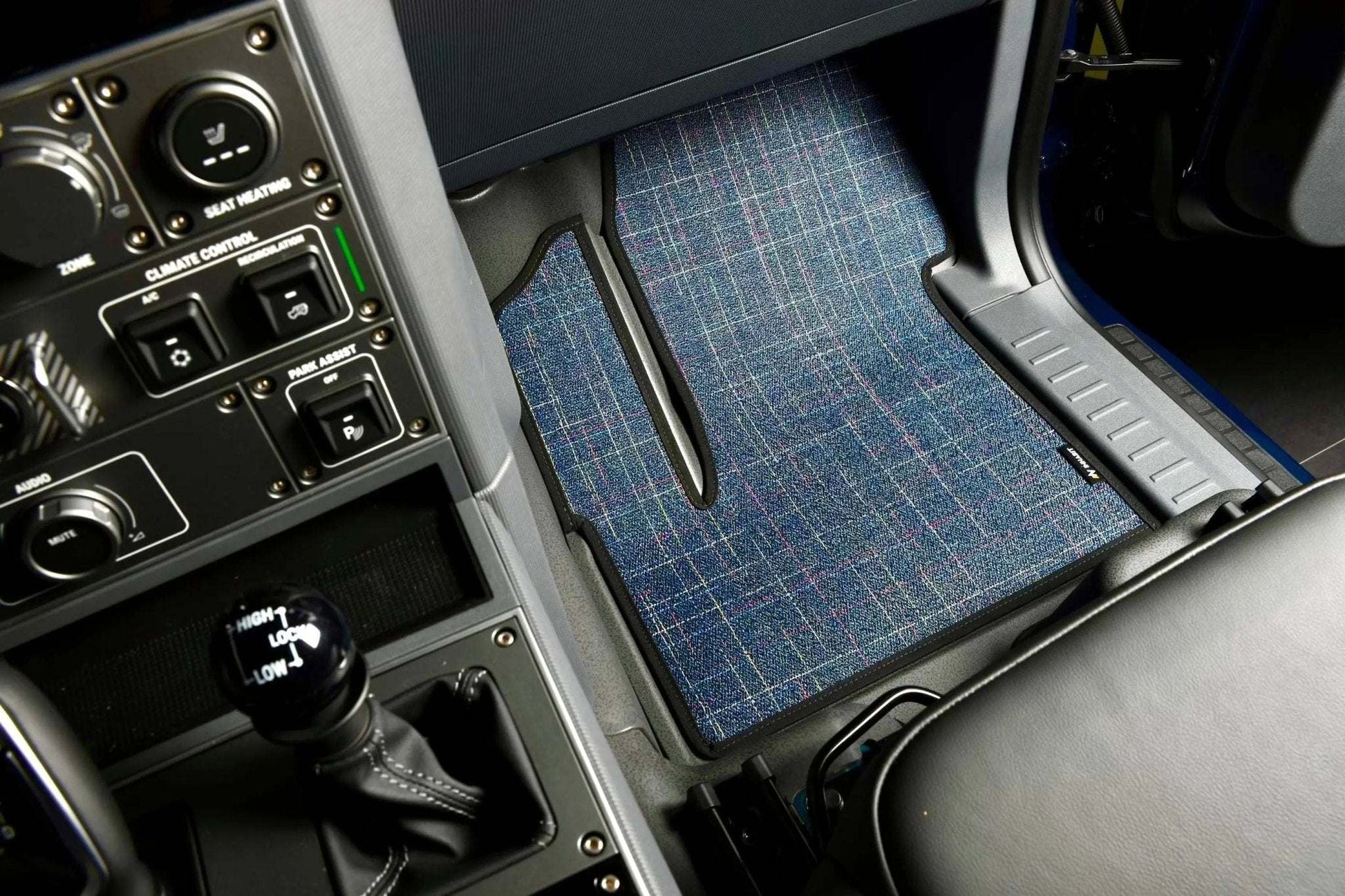 Custom floor mats for INEOS Grenadier interior, designed for comfort and protection.