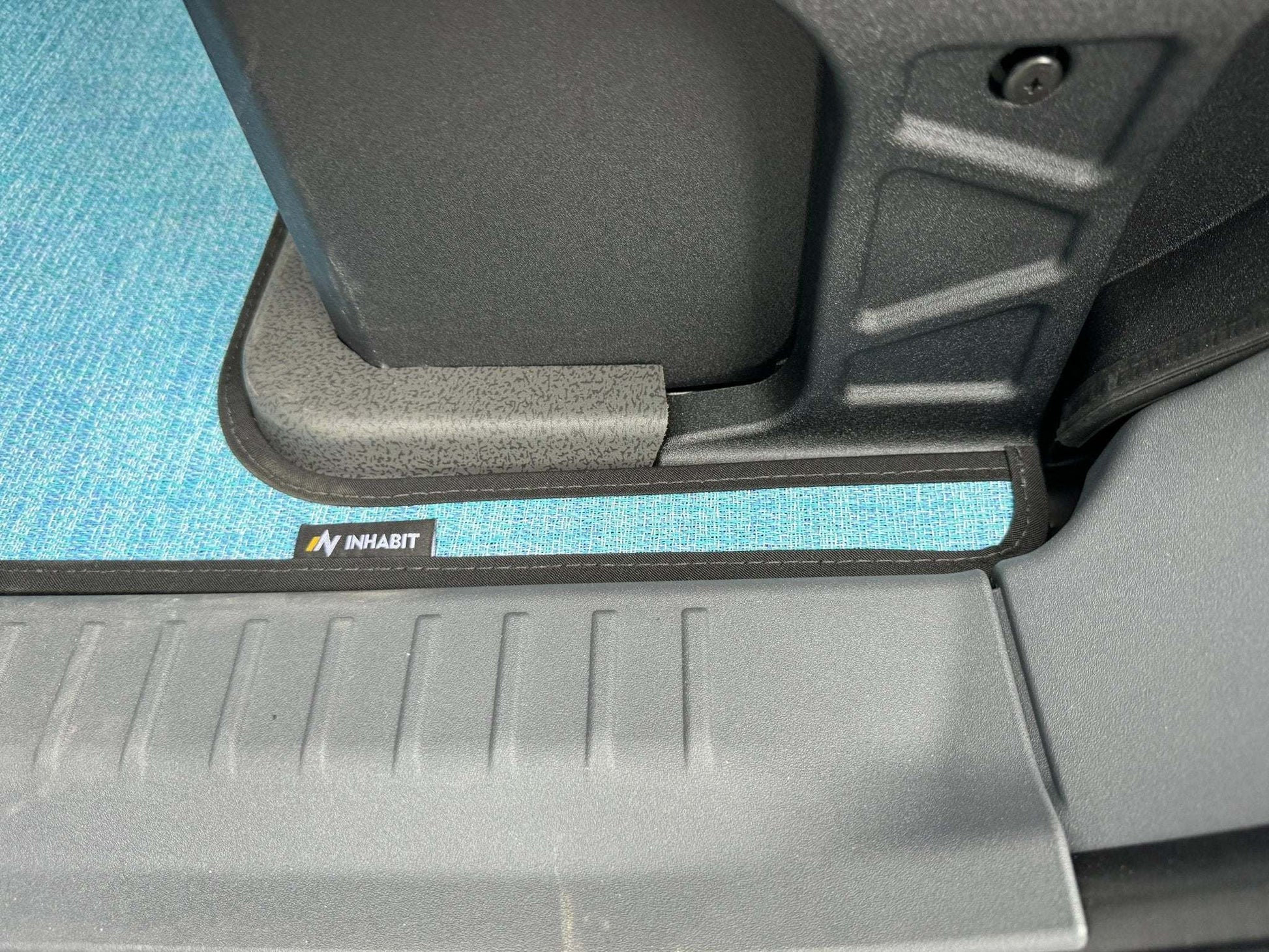 Custom floor mats for INEOS Grenadier, blue, tailored fit, durable, dirt and water trapping, Inhabit brand.