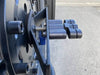 Expedition Handle 2.0 attached to tire carrier, showcasing CNC machined aluminum design with black anodized finish.