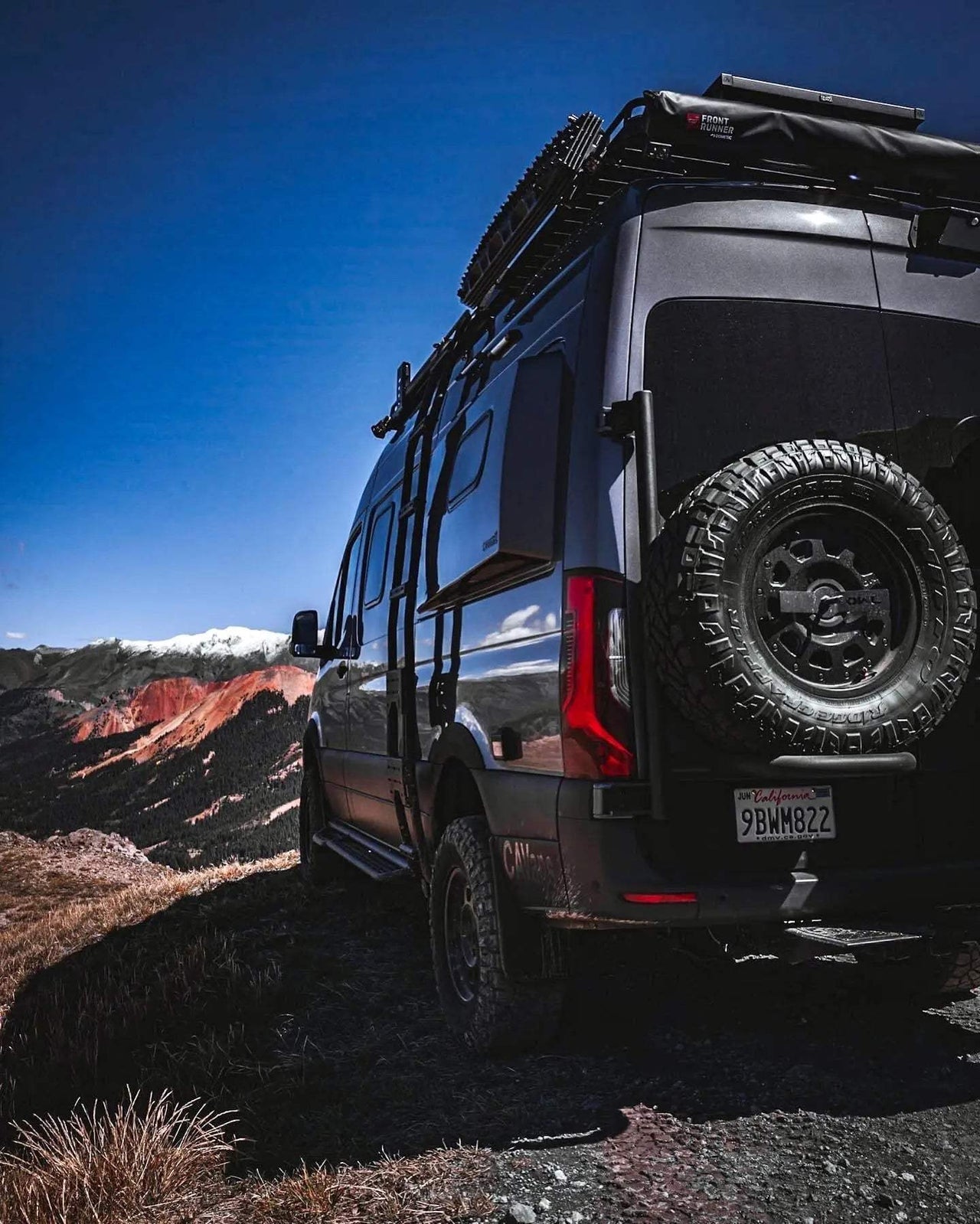 Owl Sprinter Rear Door Tire Carrier with spare tire on Mercedes Sprinter van