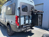Expedition Tire Carrier mounted on a 2019+ Sprinter van, designed for oversized tires and underbody space optimization.