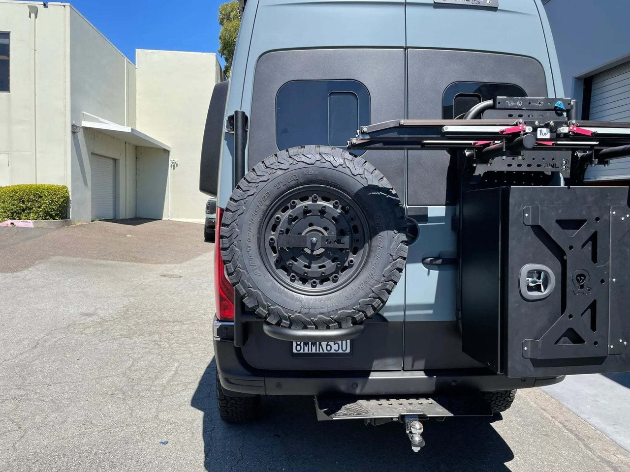 Owl Sprinter Rear Door Tire Carrier with medium cargo box on Mercedes Sprinter van