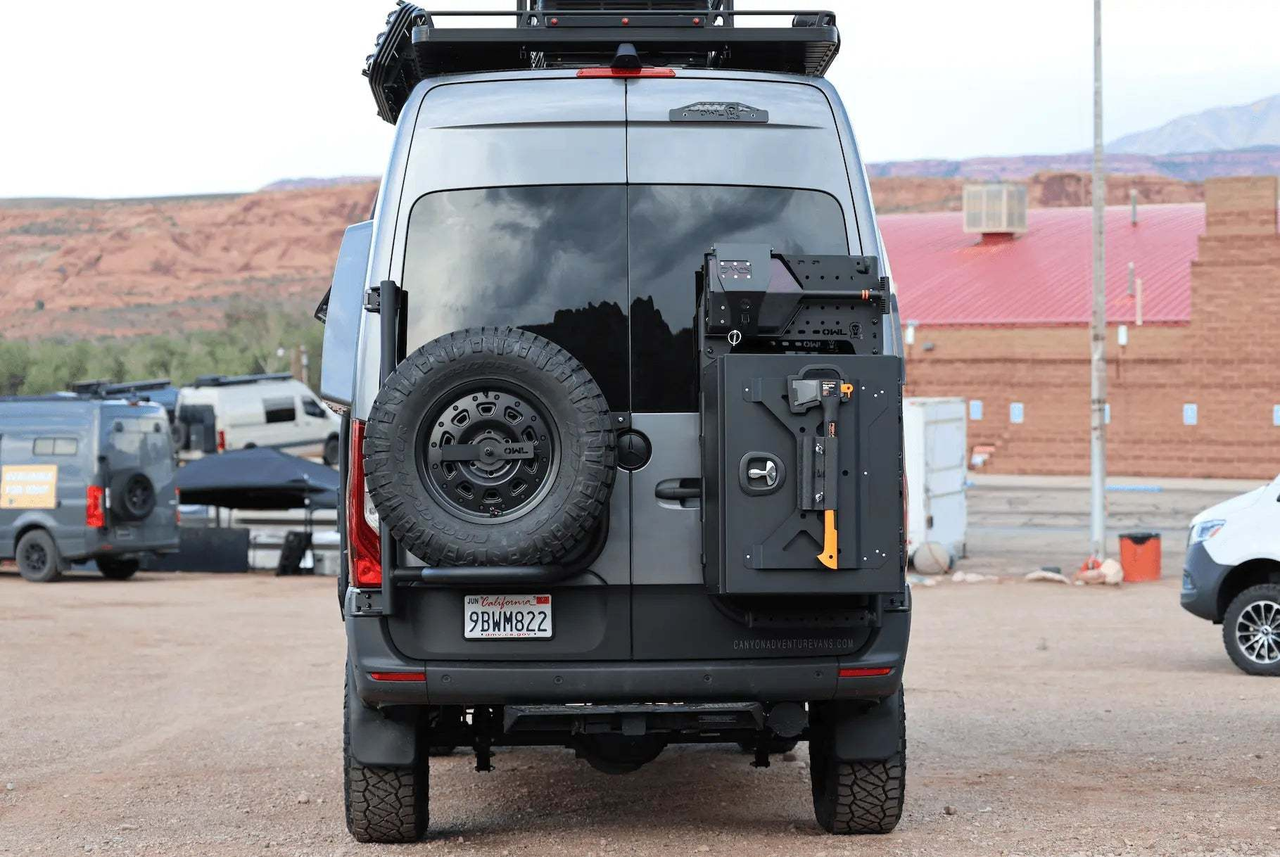 Owl Sprinter Rear Door Tire Carrier with spare tire and large cargo box on Mercedes Sprinter van