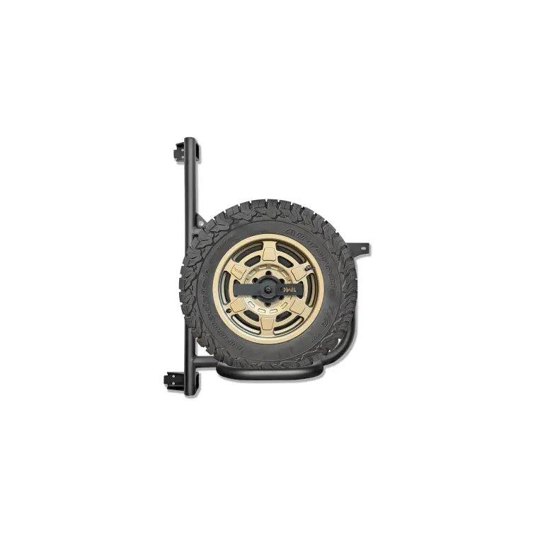 Expedition Tire Carrier for 2019+ Sprinter, rear-mounted with full-size tire, aluminum construction.