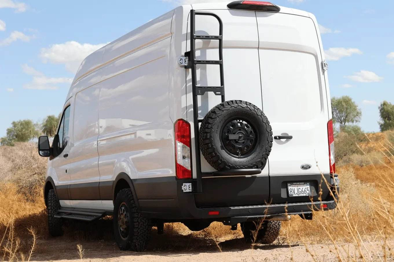 Owl Spare Tire Carrier and Ladder mounted on the rear doors of a Ford Transit