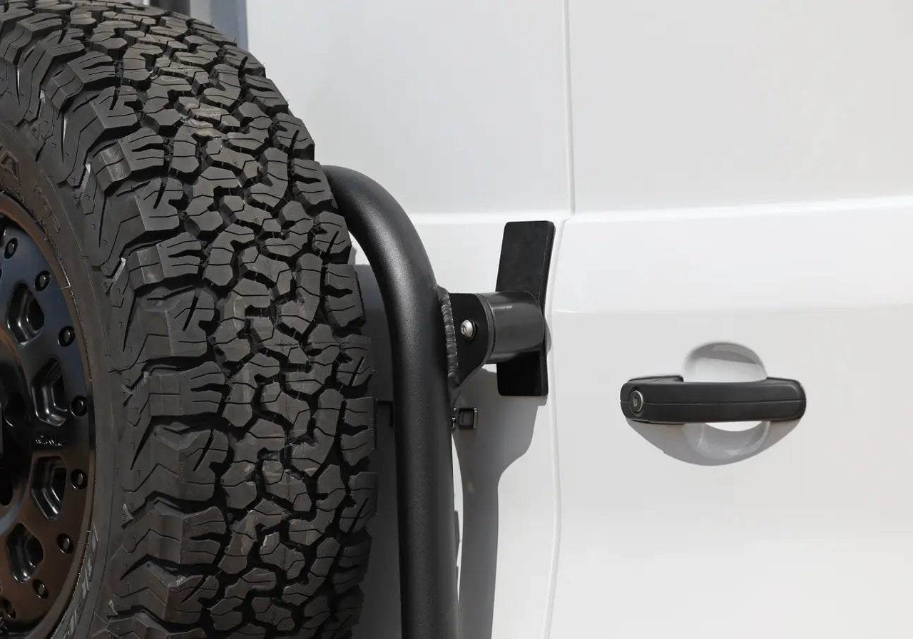 Close-up of the tire carrier on the doors of a Ford Transit