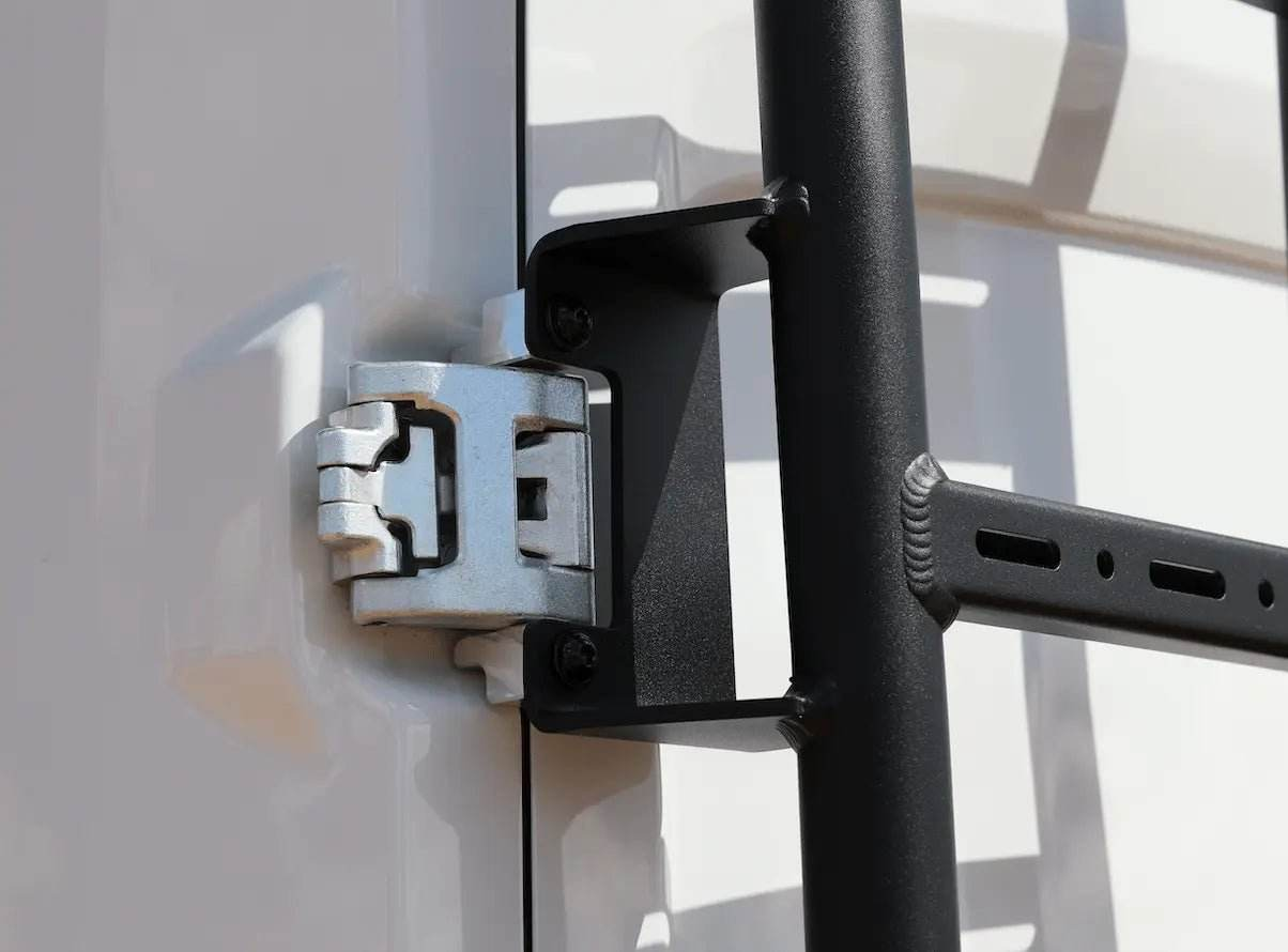 Close-up of the hinges on the doors of a Ford Transit