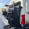 Gear Cage mounted on rear cargo boxes of a vehicle, providing modular storage for outdoor gear.
