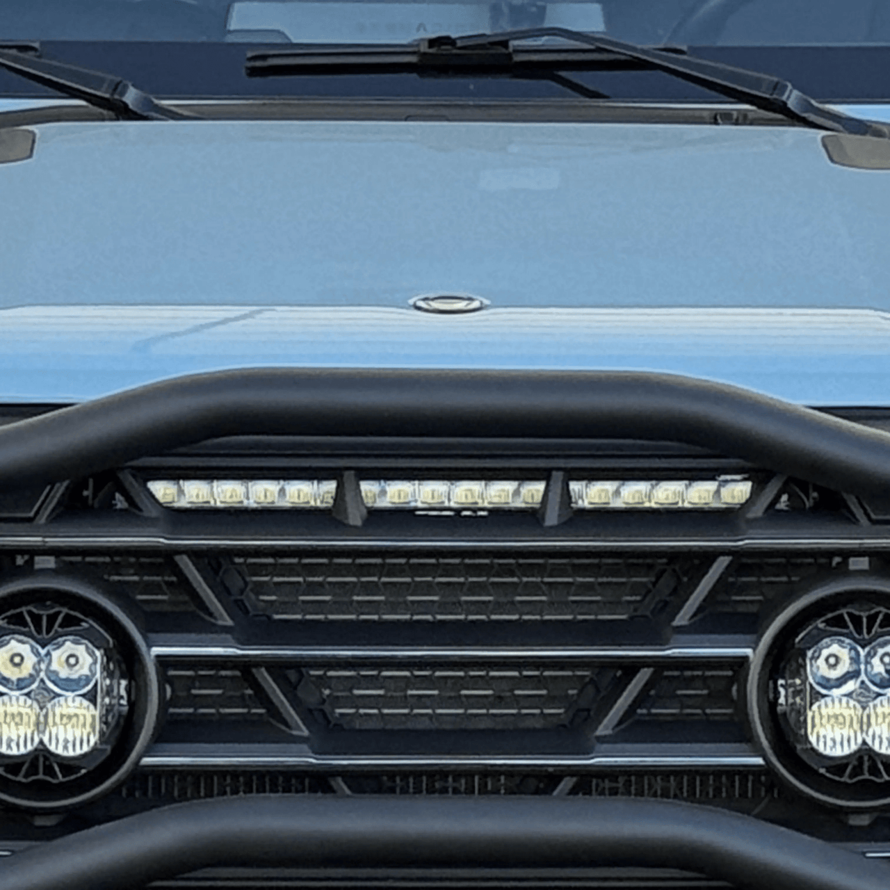 INEOS Grenadier with integrated Owl Hidden Grenadier Light Bar for off-road adventures.