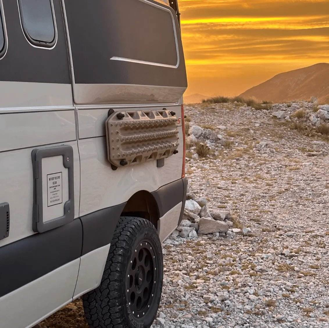 Magnetic Maxtrax Mounts on INEOS Grenadier at sunset, enhancing off-road utility and aesthetics.