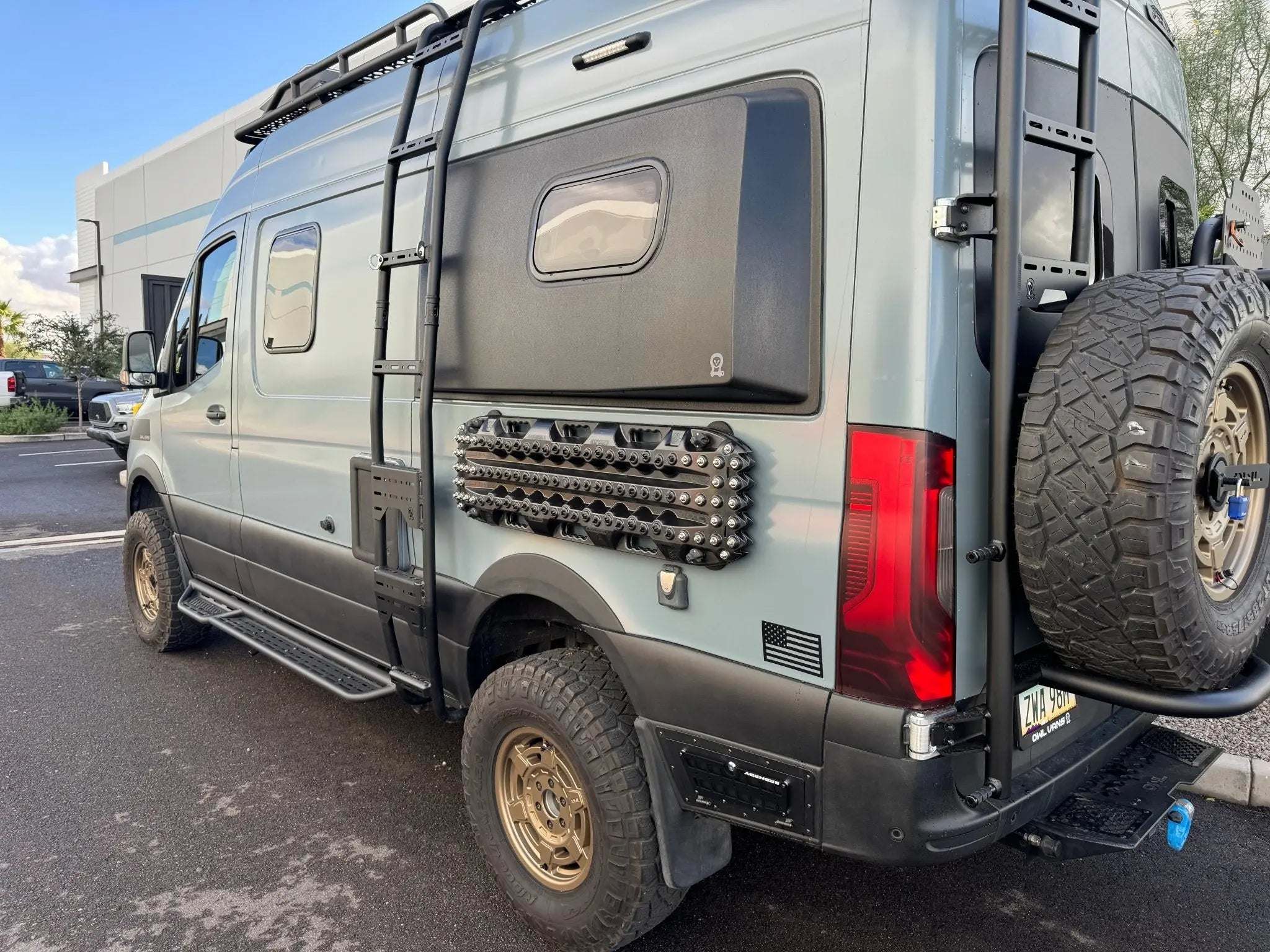 Magnetic Maxtrax Mounts for INEOS Grenadier installed on rugged vehicle.