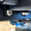 Retractable bike and gear lock installed on a Sprinter for adventure use.