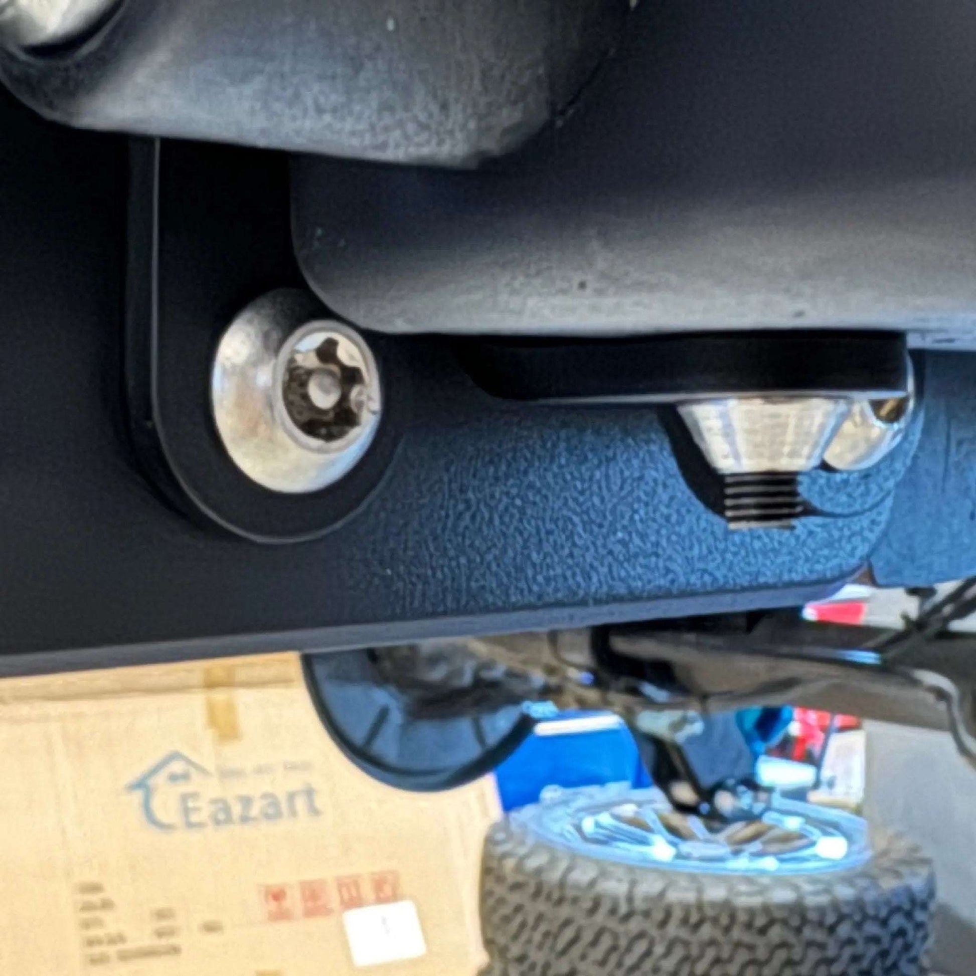Retractable bike and gear lock installed on a Sprinter for adventure use.