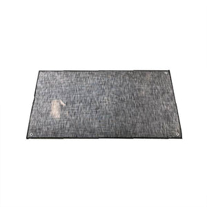 Small outdoor area rug suitable for camping, compact and easy to clean.
