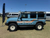 Talon Wheels for INEOS Grenadier on display at outdoor event.