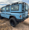 Talon Wheels on INEOS Grenadier in rugged terrain.