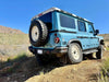 Tire relocation bracket on INEOS Grenadier off-road vehicle.
