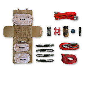 Overland INEOS SUV recovery kit with modular MOLLE roll-up bag, kinetic rope, tree saver, HMPE bridle, soft shackle, leather gloves, hitch mounted recovery point, barrel head hitch pin, and X-lock tool.