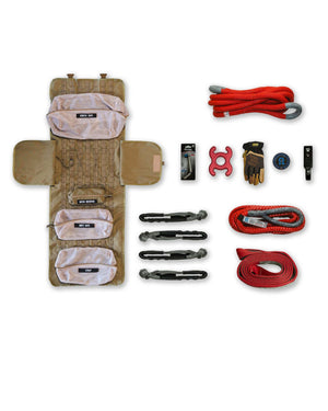 Overland INEOS SUV recovery kit with modular MOLLE roll-up bag, kinetic rope, tree saver, HMPE bridle, soft shackle, leather gloves, hitch mounted recovery point, barrel head hitch pin, and X-lock tool.