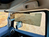 Visor upgrade installed in INEOS Grenadier vehicle interior.