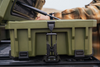 95L Rugged Mount quick-release system securing a green rugged case on a roof rack