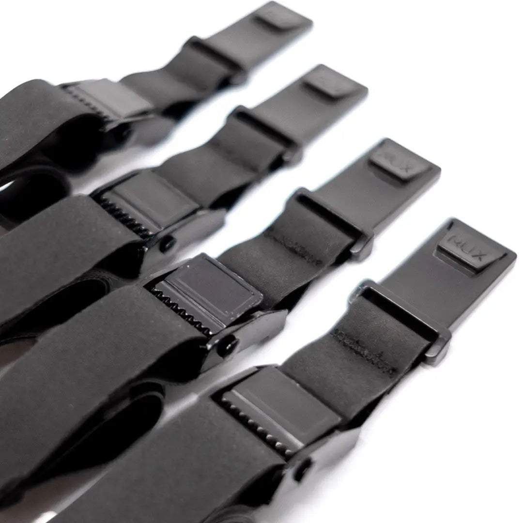 Durable black RUX tie-down straps with secure buckles for adventure and off-road use