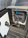 Toilet/cassette active charcoal vent system integrated in RV setup.