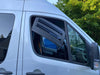 Bug Barrier front window vent installed on a white Sprinter van for ventilation without bugs or water.