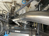 Owl Stainless Exhaust installed under 144" Sprinter van chassis showing polished stainless steel pipe and secure clamps.