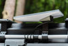 Starlink Mini Roof mount secured on Grenadier roof rail with adjustable, weatherproof aluminum bracket and anti-theft kickstand